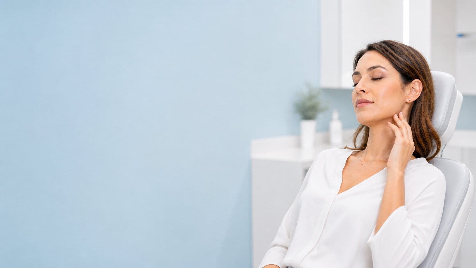 Woman relaxing in a dental treatment chair for Botox and TMJ consultation in Florence KY