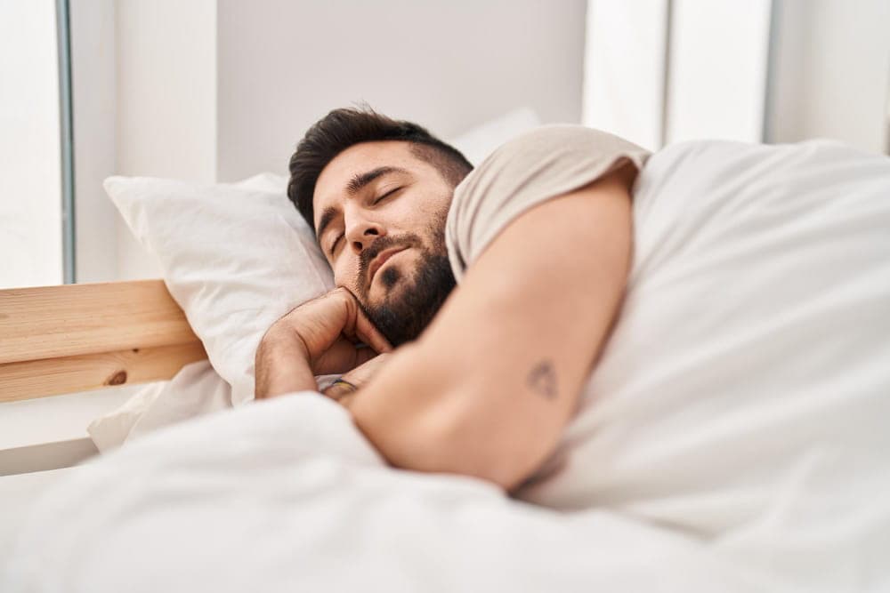 Patient sleeping comfortably after sleep apnea consultation for oral appliance therapy